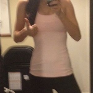 Lululemon light pink workout shirt. Size 4